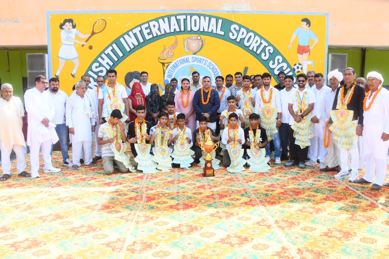 The team from Srishti School, Moth, won the gold medal in Kabaddi at the National Championship; the players were given a warm welcome upon their arrival at the school.